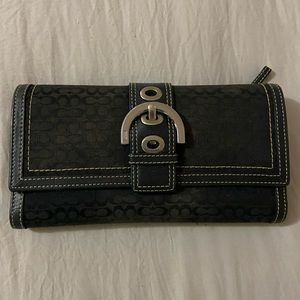 Coach classic wallet! Black with white stitching.